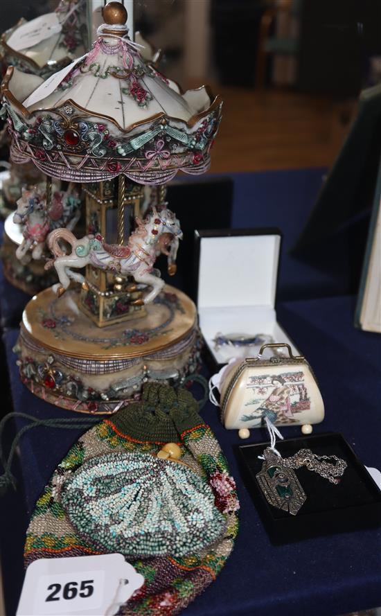 A reproduction musical carousel and miscellaneous items including beaded purses, silver jewellery, etc